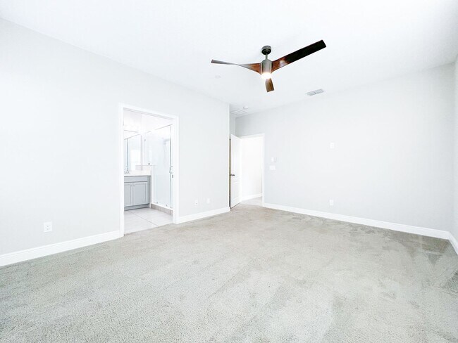 Building Photo - Luxury 4-Bedroom Townhome in Laureate Park – Now Available!