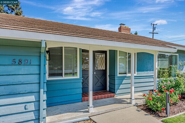 Building Photo - 5891 Caulfield Dr