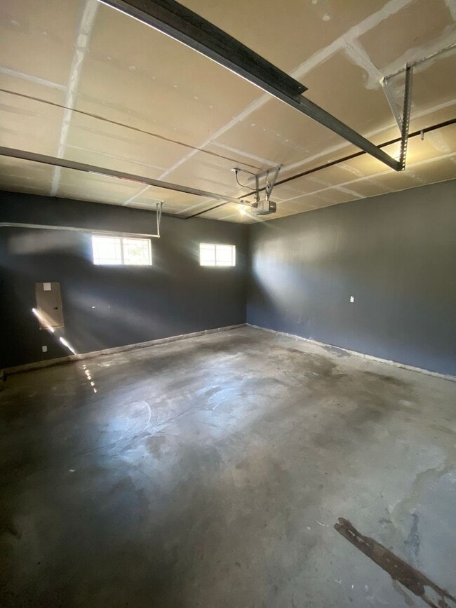 Building Photo - No Mower Needed! Great Townhome In A Beaut...