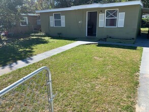Building Photo - Single family home with fenced yard.