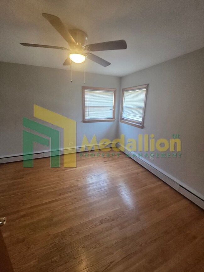 Building Photo - Spacious 6-Bedroom Home with Finished Basement and Backyard