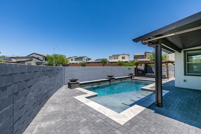 Building Photo - Spacious 4 Bedroom + Loft Tule Springs Home with Heated Pool & 3-Car Garage