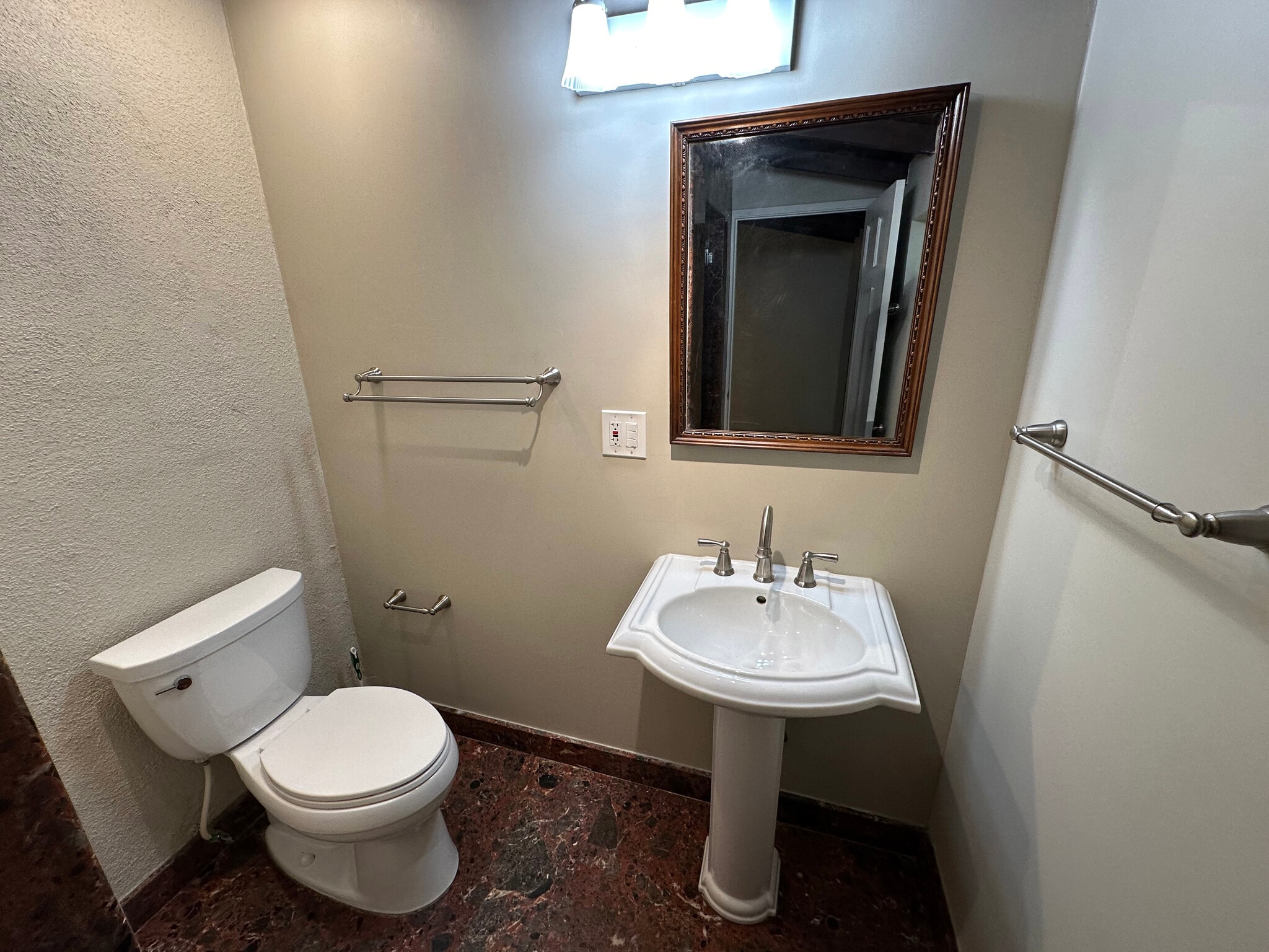 Master bath sink and toilet - 10809 Huston St