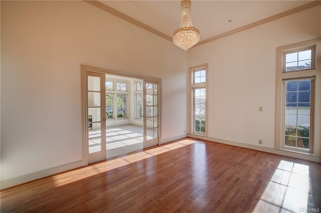 Building Photo - 8479 NE Woodland Cove Dr