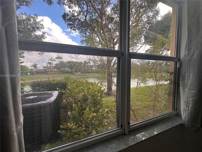 Building Photo - 3390 NE 13th Cir Dr