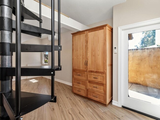 Building Photo - Studio with Loft, Private Patio, and All U...