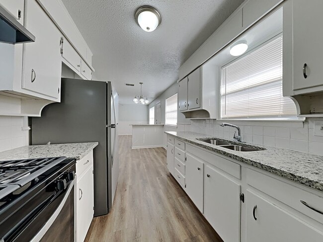 Building Photo - Newly Renovated Single Family Home | 3 BR/1.5BA | 1-Car Covered Parking | Gated backyard