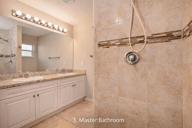 Building Photo - Spacious Three-Bedroom Home with Open Floor Plan, Large Yard & Screened Patio