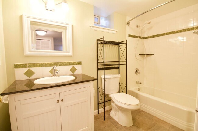 Building Photo - Sunny Sunnyside Bungalow with Finished Basement & Private Backyard Retreat