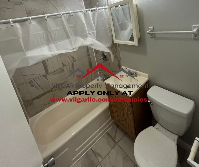 Building Photo - Step into comfort and security in this bea...