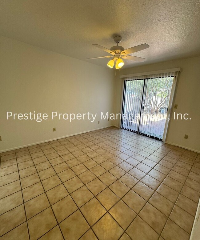 Building Photo - Totaling 3/3 With The Guest House; This Lovely Central Townhome is Everything You Need!