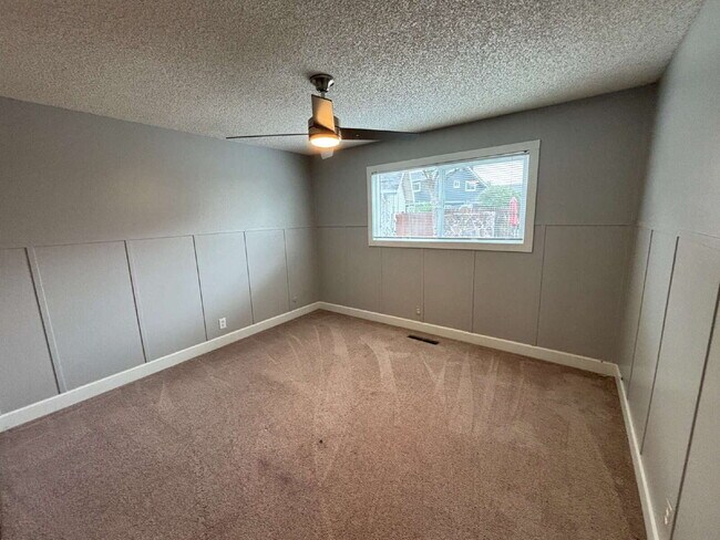 Building Photo - "Charming Concord Retreat: 3-Bedroom Gem with Granite Accents & Cozy Fireplace"