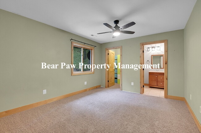 Building Photo - Spacious 4-Bedroom Retreat in Scenic Conif...