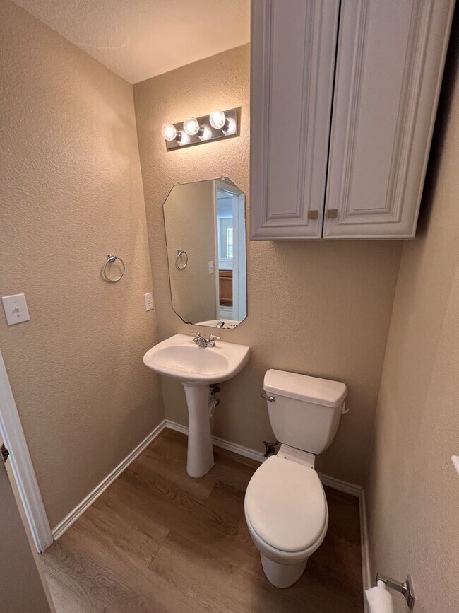 Building Photo - Generous Outdoor Space & Lawn Care Included!