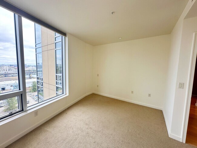 Building Photo - Spacious, open-concept 1-bedroom 7th floor condo in the South Waterfront District.