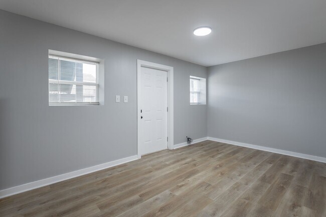 Building Photo - Discover Modern Living at Genesis Apartmen...