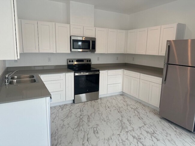 Building Photo - Now Leasing Modern Heights Apartments