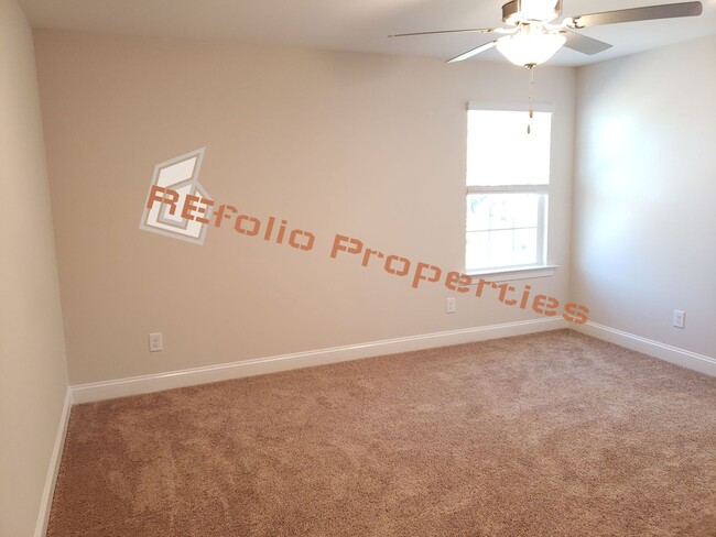Building Photo - Charming 4 Bedroom, 2.5 Bath, 2-Car Garage...