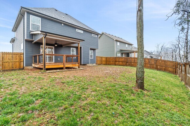 Building Photo - Pet Friendly Three Bedroom with Bonus!