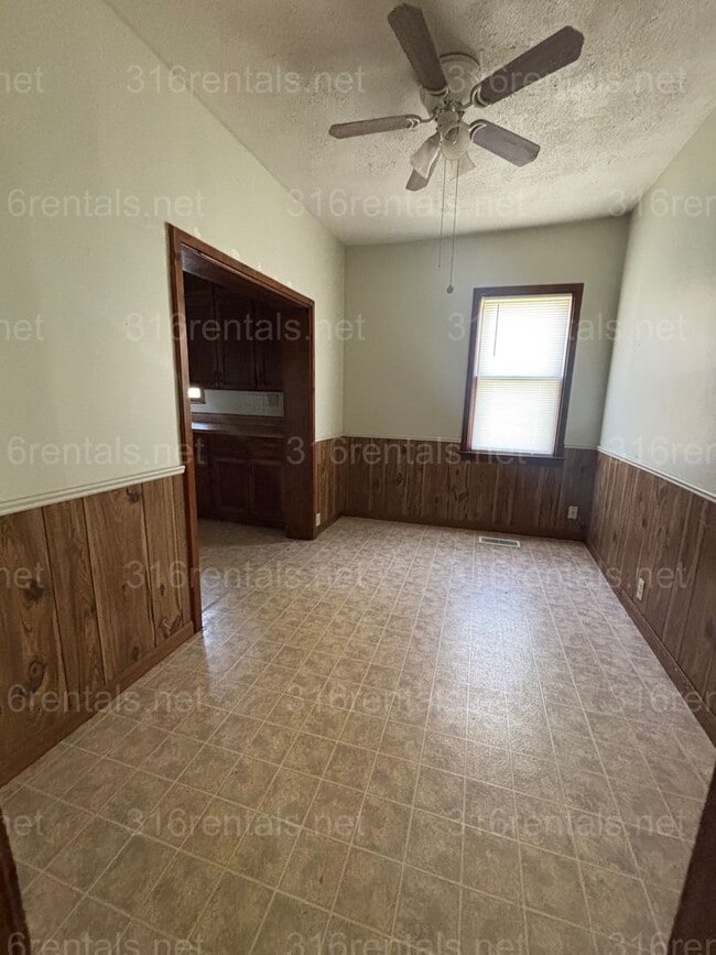 Building Photo - Two bed one bath fenced in yard house available now