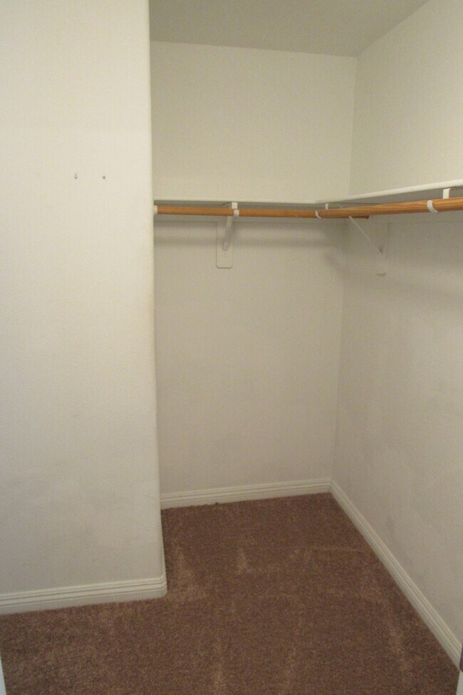 Building Photo - AMAZING 2 STORY TOWNHOME LOCATED IN A GATE...