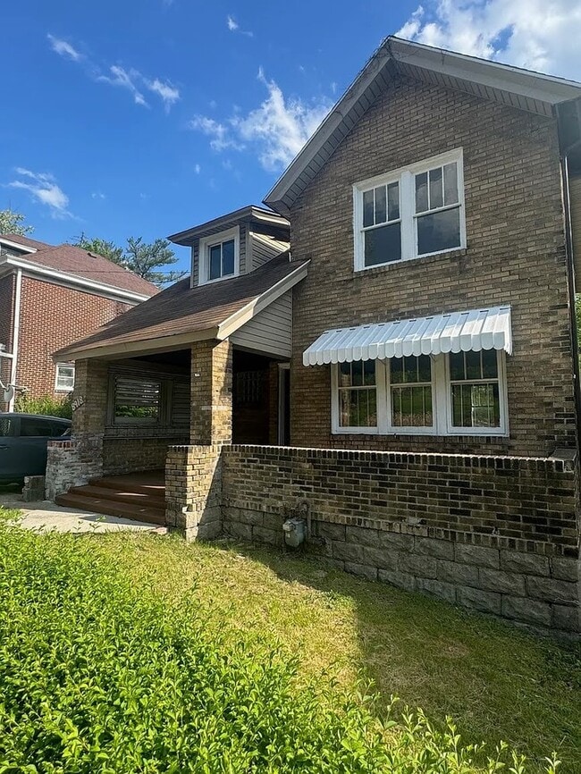 Building Photo - Charming Brick Two-Story Home with Covered Front Porch