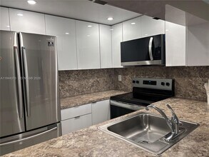 Building Photo - 10023 Winding Lake Rd