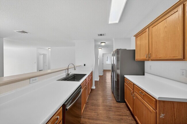 Building Photo - 4935 Dahlia Terrace