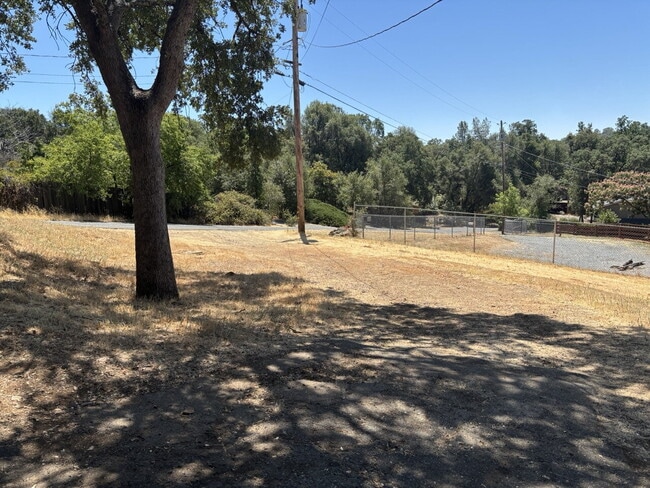 Building Photo - Fully remodeled home nestled on a spacious...