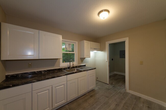 Building Photo - Completely remodeled 3 bed 1 bath home ready for a new tenant. Apply today and get approved for a...