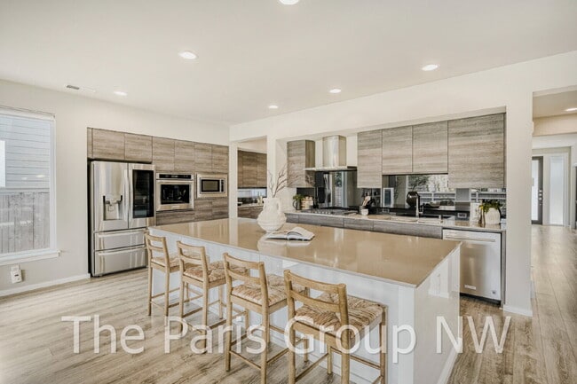 Building Photo - Luxury MainVue Maple Valley Home * UPGRADES * Central A/C * Theater Room * Outdoor Fireplace