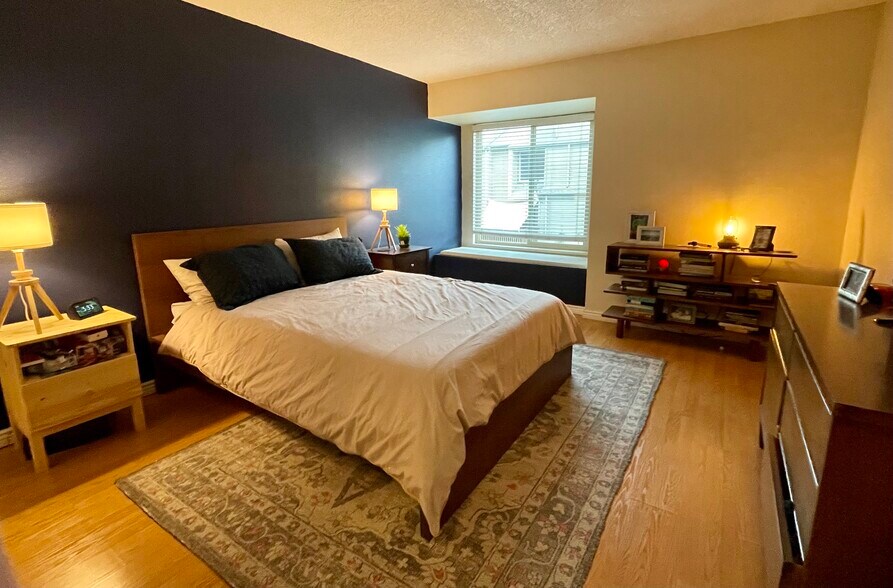 Spacious primary bedroom with window seat + walk-in closet - 3656 S Depew St