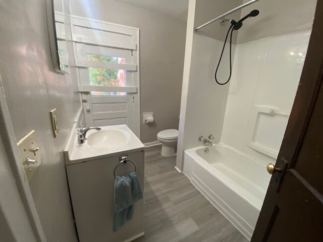 Building Photo - Updated 4-Bed with Porch & 2-Car Garage on...