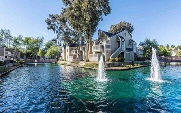 Building Photo - Beautiful 2-Bedroom Condo with Serene Water Views and Modern Amenities