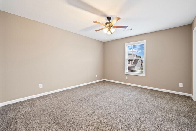 Building Photo - Four Bedroom with Three Car Garage!