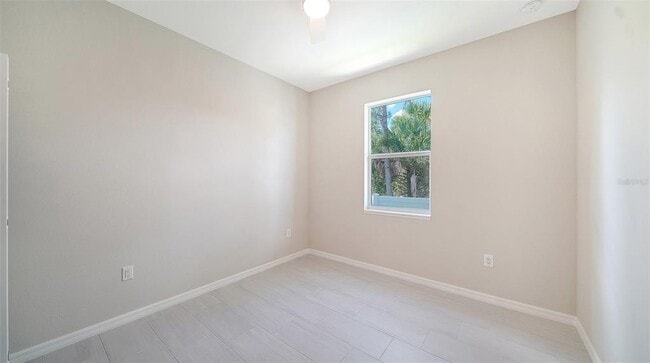 Building Photo - 6227 Tropicaire Blvd