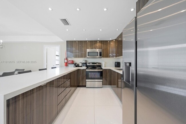 Building Photo - 19370 Collins Ave