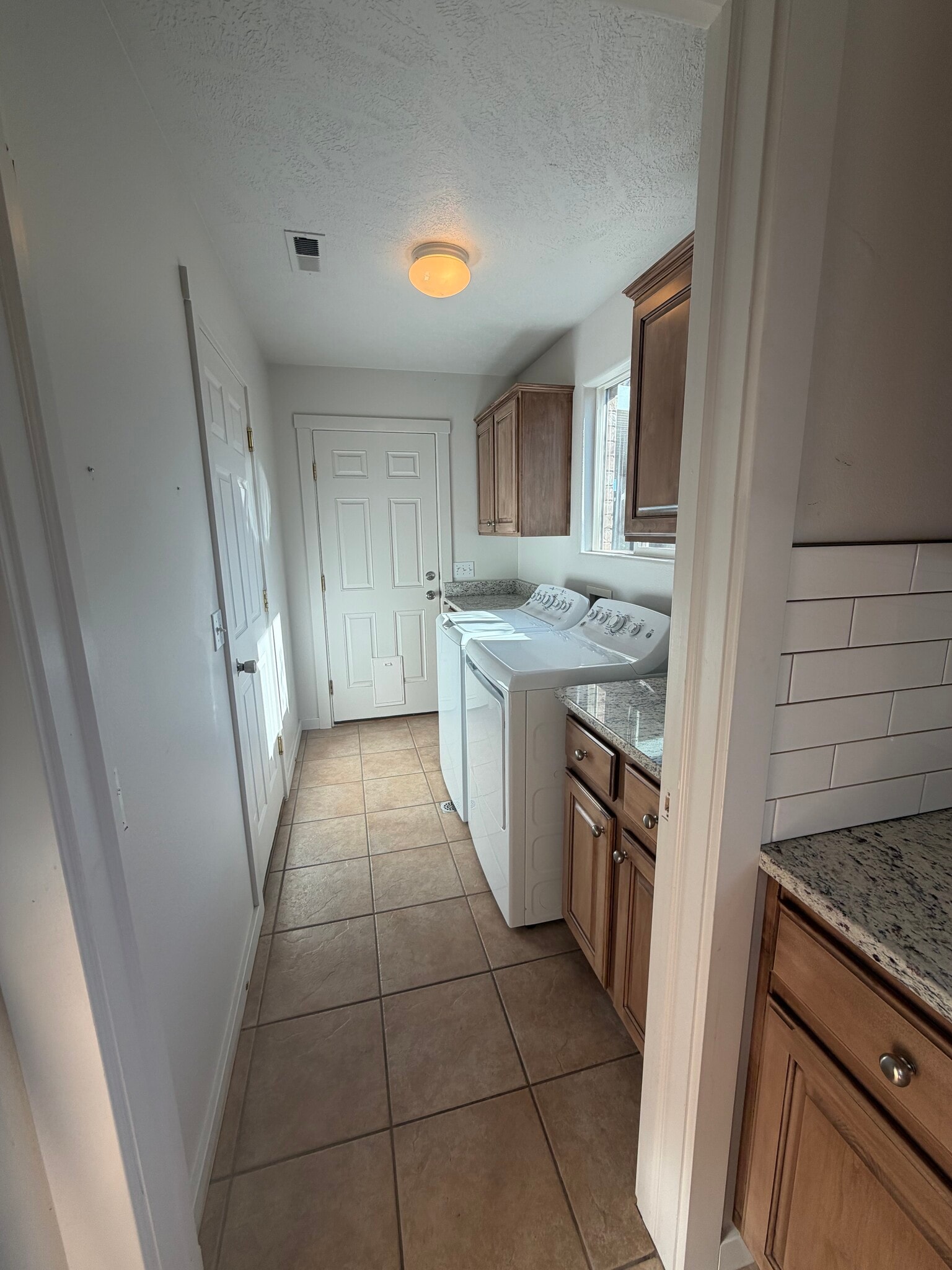 Laundry room/door to backyard - 559 E 300 S