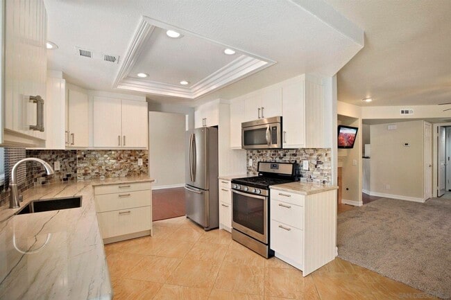 Building Photo - 4 Bed/2.5 Bath Home in Poway. Open Floor Plan, AC/Heat, W/D + Laundry Room and 3 Car Garage!