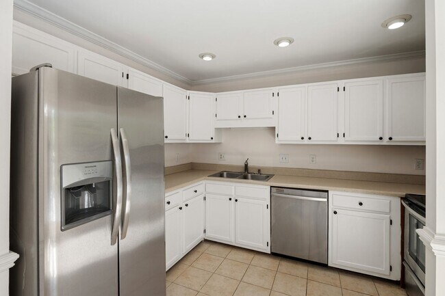 Building Photo - LOCATION!! Updated Townhome in Sought-After Durham Woodcroft neighborhood