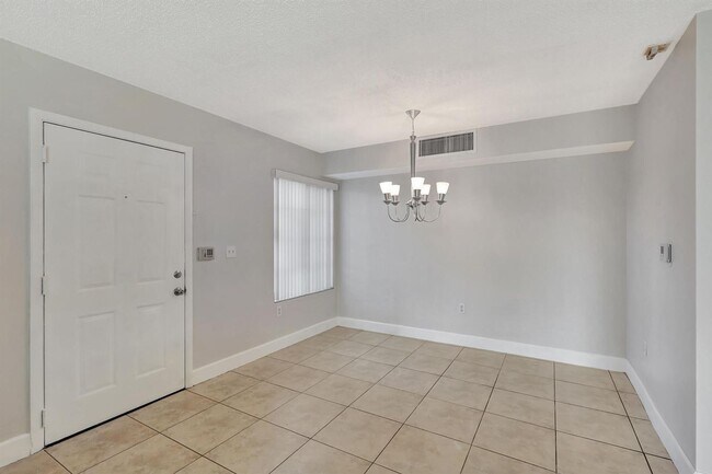 Building Photo - Spacious 3BR/2.5BA in Gated Milano Community
