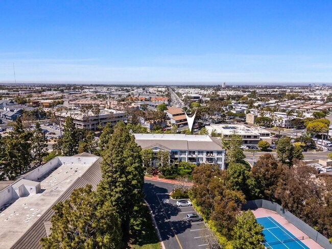 Building Photo - COMING AVAILABLE 4/5/26: Updated Versailles Condo in Newport Beach