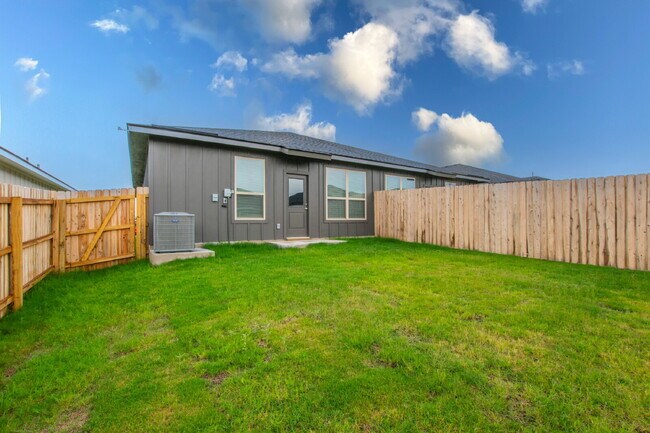 Building Photo - Brand New 3BR Duplex with Modern Concrete Floors & Fenced Yard!