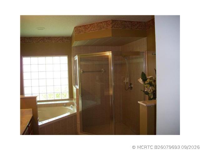 Building Photo - 6173 NW E Deville Cir