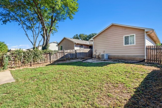 Building Photo - Derby Duplex with Fenced Yard!