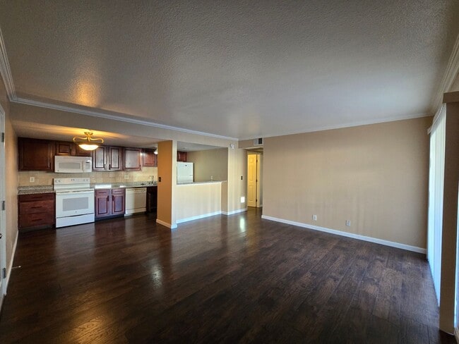 Building Photo - Beautiful 2-Bedroom First-Floor Condo in a Guard-Gated Community