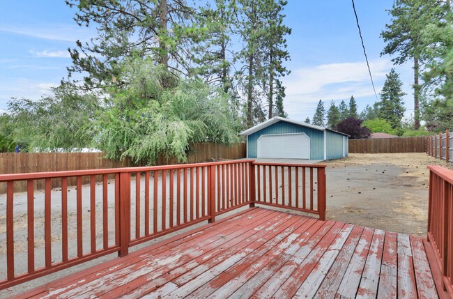 Building Photo - Charming Unfurnished Spokane Home with Large Shop in a Prime Northwest - Unfurnished