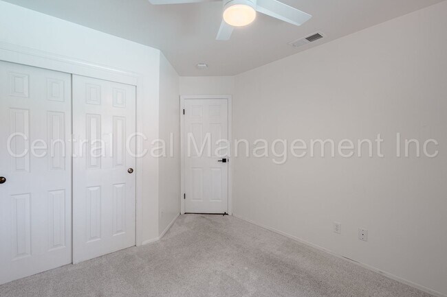 Building Photo - 4 Bedroom/2 Bath Home with a Pool and Sola...