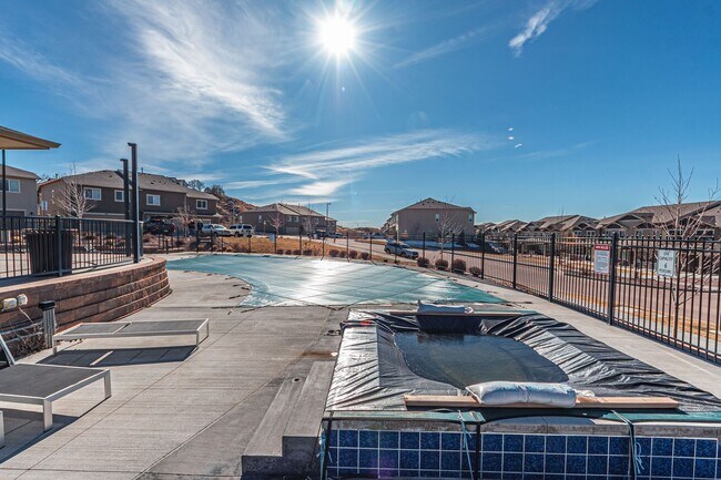 Building Photo - Cozy Fully Furnished  COS Townhome