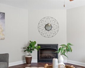 Fireplace in living room - 1109 Maple Tree Ln